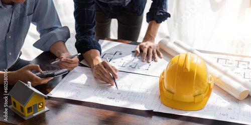 engineer team planning design house, modifying plan, creating construction project and addition according to customer requirement
