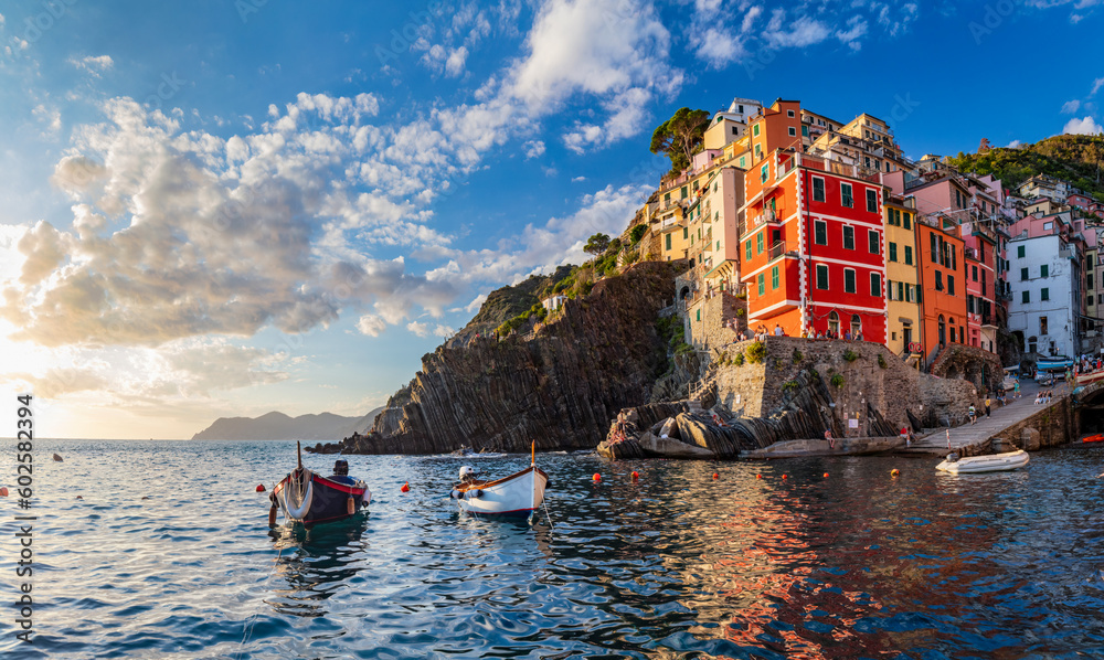 Riomaggiore in Cinque Terre, Italy at sunset - obrazy, fototapety, plakaty 