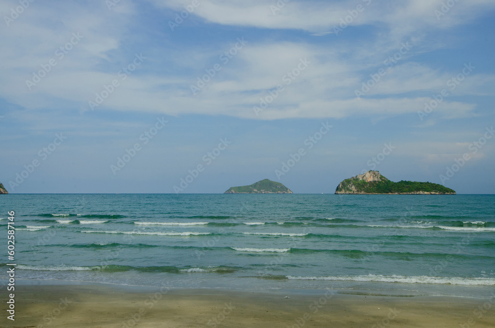 Beautiful sea with small waves and islands in Thailand