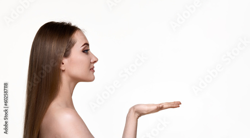 woman holding on open arm copy space on white background.