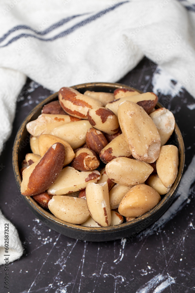 Brazil nut. Brazil nut in wooden bowl. Superfood. Vegetarian food concept. healthy snacks Brazil nut. Brazil nut in wooden bowl. Superfood. Vegetarian food concept. healthy snacks