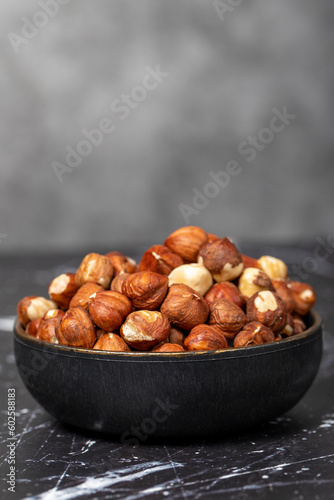 Hazelnut. Peeled hazelnuts in bowl. Superfood. Vegetarian food concept. Healthy snacks