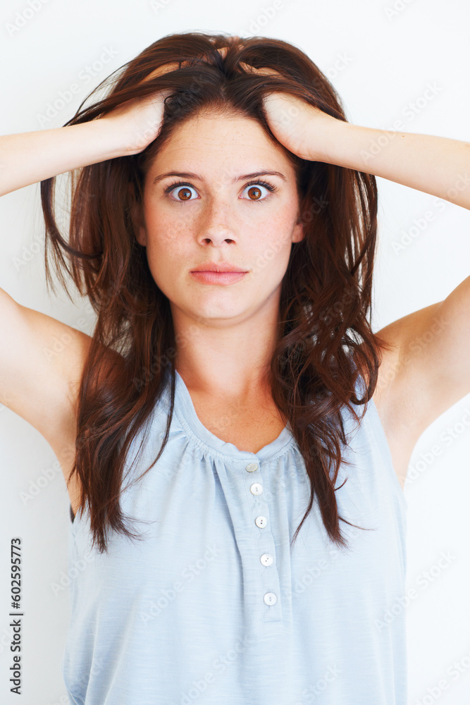 Portrait, shocked and woman touching her hair in studio isolated on a white background. Wow, omg and face of female person with surprised expression, emoji and unexpected news, announcement and wtf. Portrait, shocked and woman touching her hair in studio isolated on a white background. Wow, omg and face of female person with surprised expression, emoji and unexpected news, announcement and wtf.