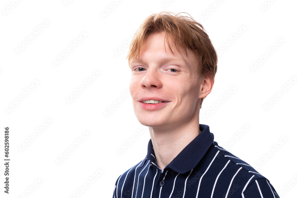 handsome young blond man in blue polo model appearance handsome young blond man in blue polo model appearance