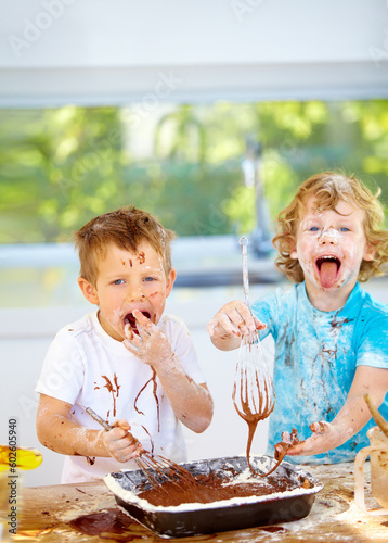 Принти на полотні Portrait, baking and children with messy friends in the kitchen together, having fun with ingredients while cooking
