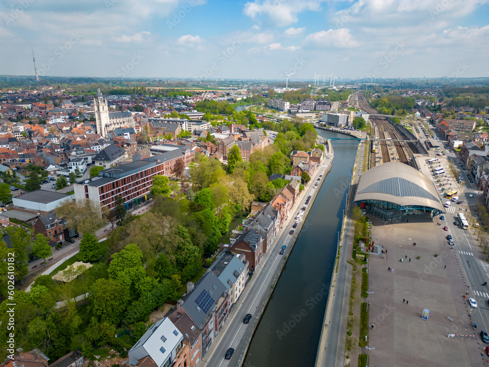 Halle, Flemish Brabant Region, Belgium, 01 05 2023, aerial top down view of the railway station and the sea canal in the city of Halle on a sunny spring day. High quality photo. High quality photo