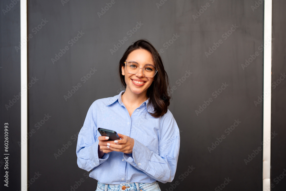 Woman use smartphone isolated on black Woman use smartphone isolated on black