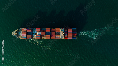 cargo container ship carrying in sea to import export goods and distributing products to dealer and consumers to international asia pacific and worldwide,