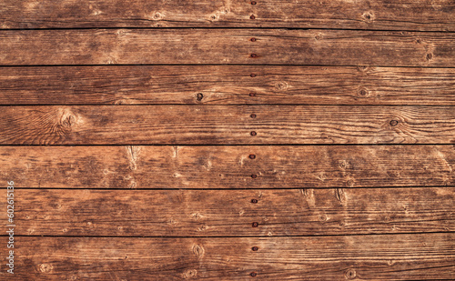 Brown wood texture background coming from natural tree. The wooden panel has a beautiful dark pattern, hardwood floor texture