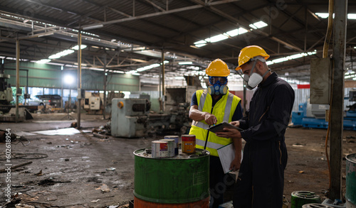 Scientists and government officials Inspect and collect chemical leak samples in industrial sites. to be thoroughly investigated in the laboratory
