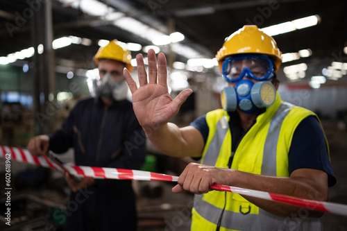 Fotografie Restricted area, officials employ white and red stripes to block the area where a chemical leak is occurring