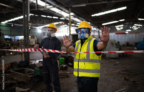 Obraz na plátně Restricted area, officials employ white and red stripes to block the area where a chemical leak is occurring