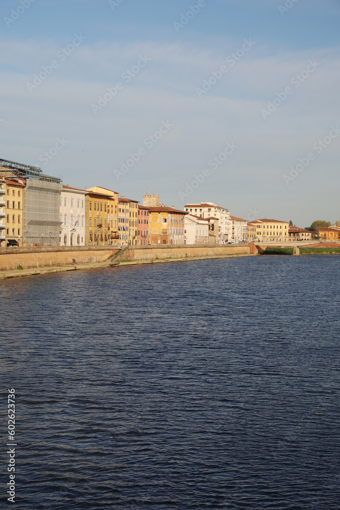 Old houses at the Arno river in Pisa, Italy