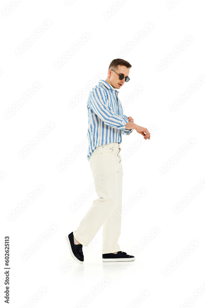 happy confident man in sunglasses and blue striped shirt happy confident man in sunglasses and blue striped shirt