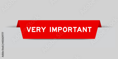Red color inserted label with word verty important on gray background photo