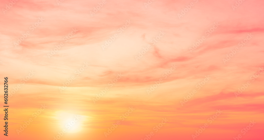 Sunset sky in the morning with pink, yellow, orange sunrise, Romantic horizon nature sky clouds background 
