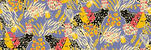 Saturated wild bright tropical positive cheerful multicolored abstract seamless summer patern. Tropics with palms, bananas, leaves, birds and spots of wild animals, tiger and leopard.