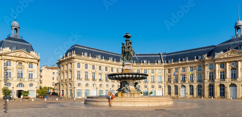Woman tourist visiting Bordeaux city in France,  La bourse square with fountain- Nouvelle aquitaine photo