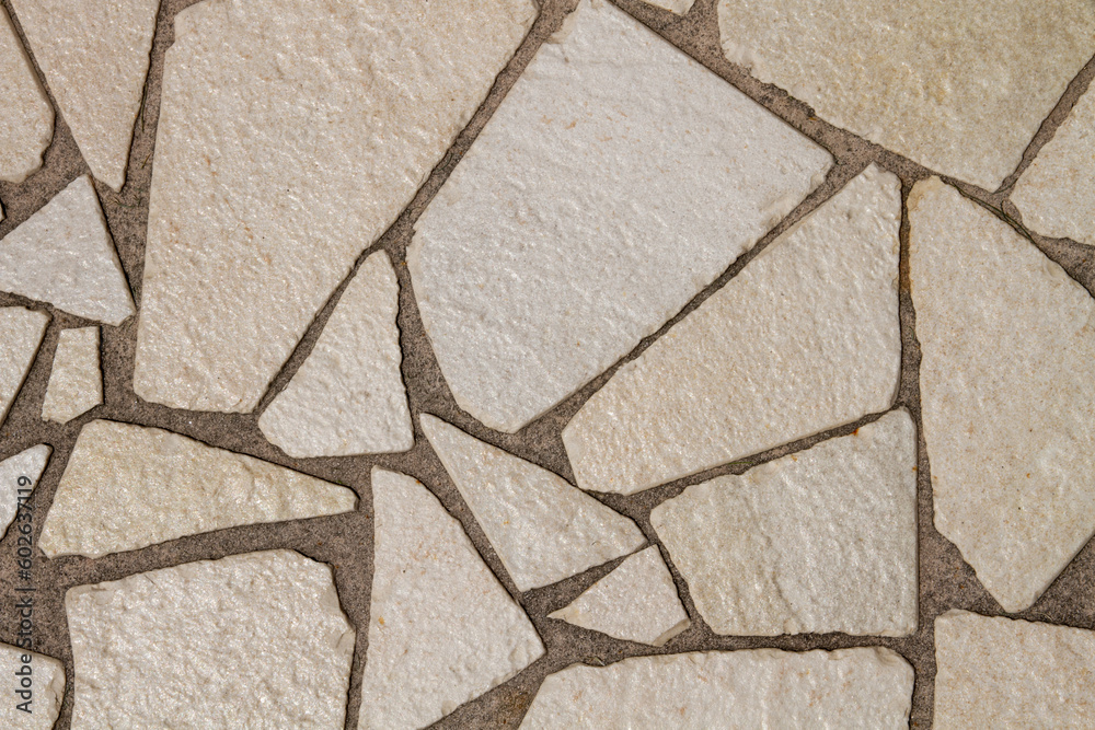 Obraz premium The texture of the tiles on the ground is broken.