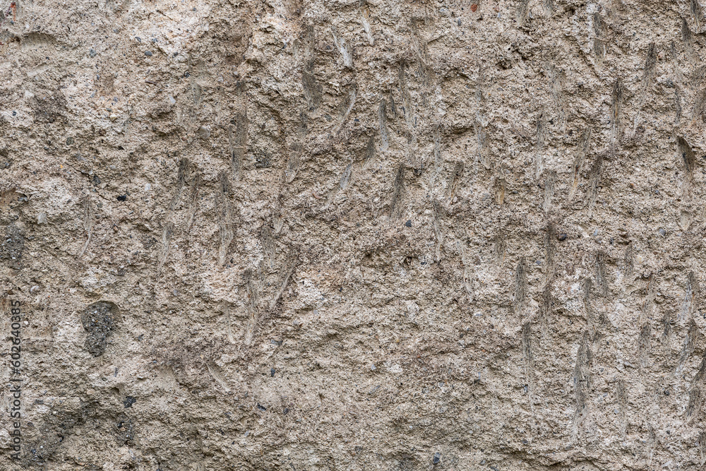 Rough textures on a white wall, the surface is uneven.