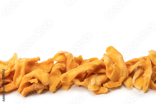 Dried melon slices isolated on a white background.