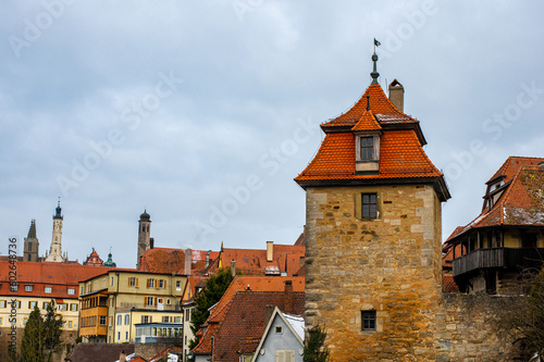 View of the town wall and Kobolzeller Turm in Rothenburg ob der Tauber, the Franconia region of Bavaria, Germany. Medieval old town. The most romantic town in Germany.