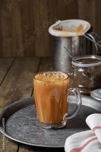Hot drink tea with milk Malay called Teh Tarik is a popular breakfast drink in Malaysia
