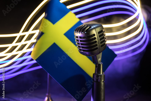 Microphone on a background of a blurry flag Sweden close-up