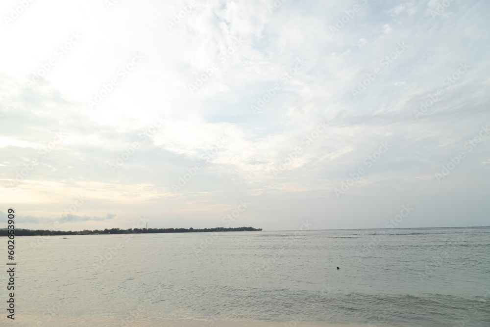 Lombok and Gili Air islands, overcast, cloudy day, sky and sea. Sunset, sand beach.