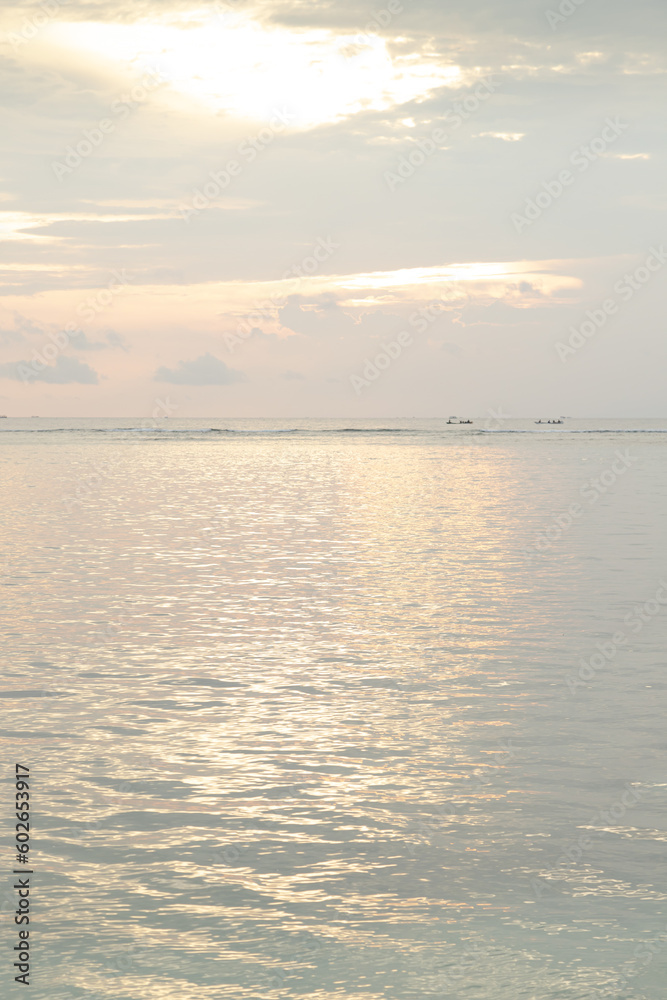 Fototapeta premium Lombok and Gili Air islands, overcast, cloudy day, sky and sea. Sunset, sand beach.