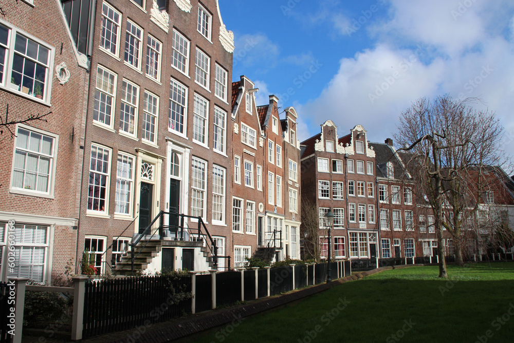 old brick houses at a beguinage (begijnhof) in amsterdam (the netherlands) 