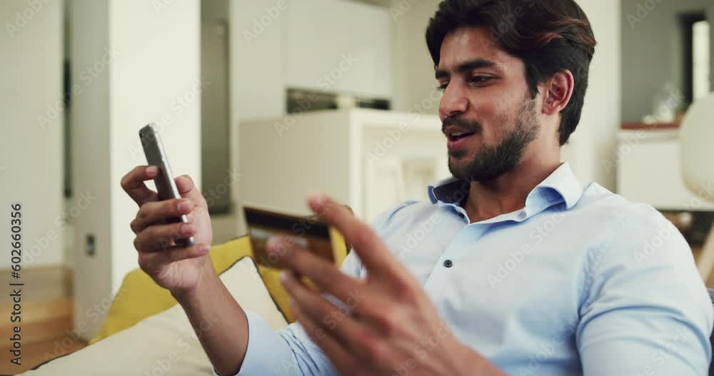 Credit card, phone and happy with man on sofa for online shopping, payment and investment. Ecommerce, relax and fintech with male customer at home for mobile banking, retail and digital transaction Credit card, phone and happy with man on sofa for online shopping, payment and investment. Ecommerce, relax and fintech with male customer at home for mobile banking, retail and digital transaction