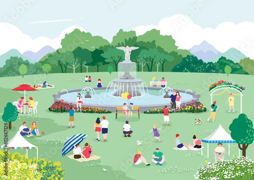 people who enjoy relaxing and picnics in outdoor parks with fountains on holidays