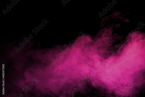 Pink powder explosion on black background. © Philip