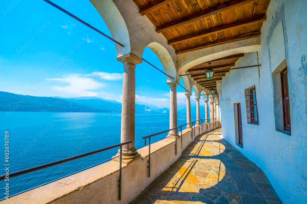 Φωτογραφία Archs in Eremo di Santa Caterina del Sasso and Lake Maggiore with Mountain in Leggiuno in Lombardy, Italy