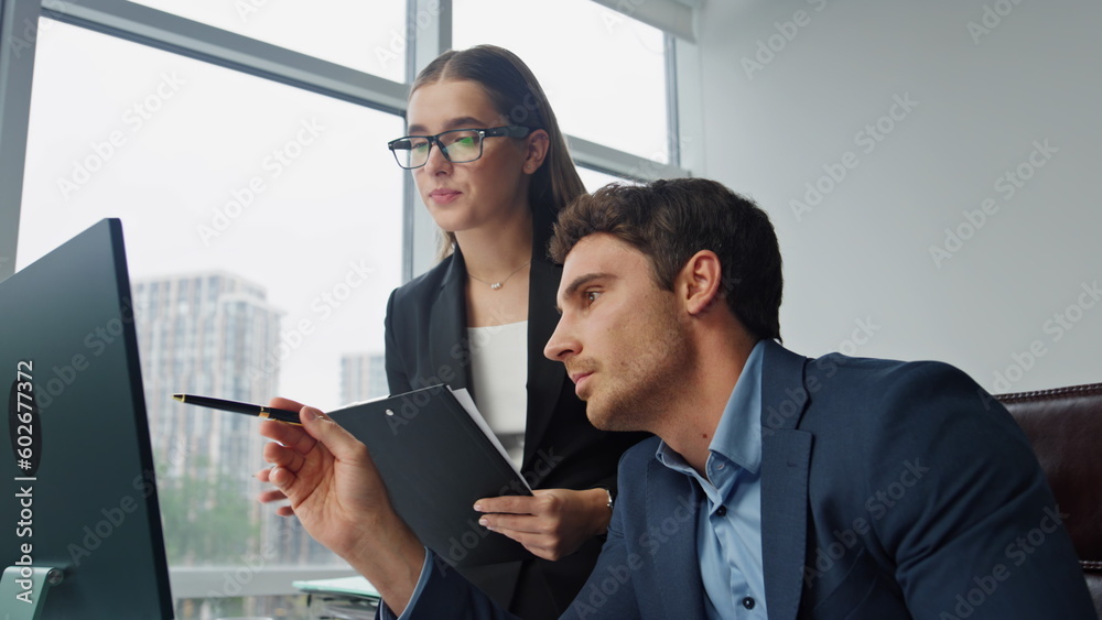 Two managers discussing digital marketing report. Focused assistant taking notes Two managers discussing digital marketing report. Focused assistant taking notes