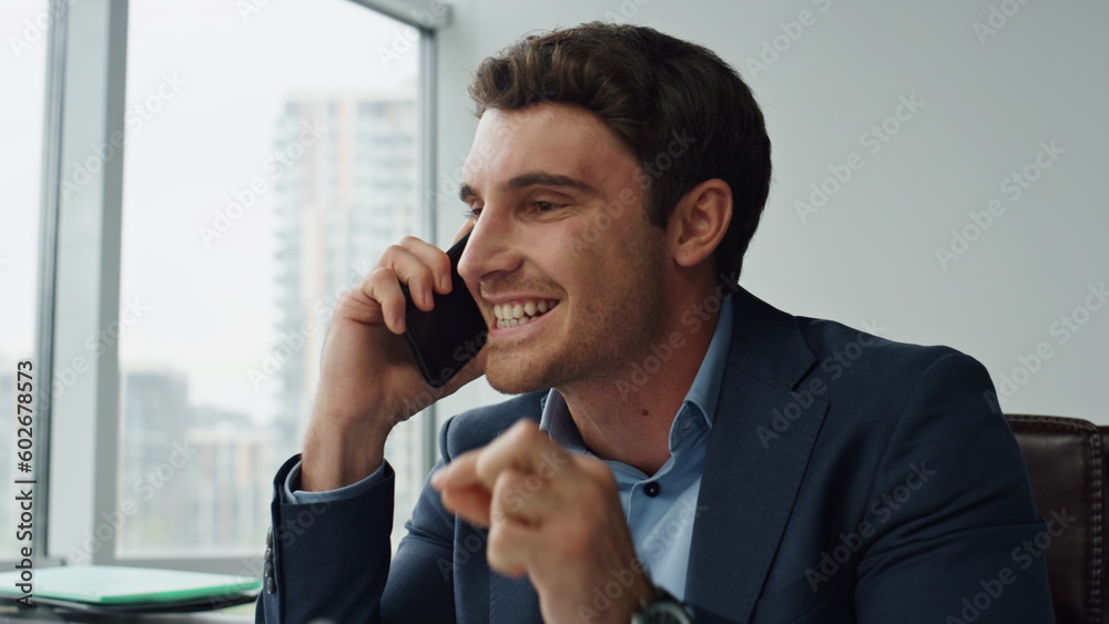 Closeup mad businessman calling partner in office. Annoyed customer explaining Closeup mad businessman calling partner in office. Annoyed customer explaining