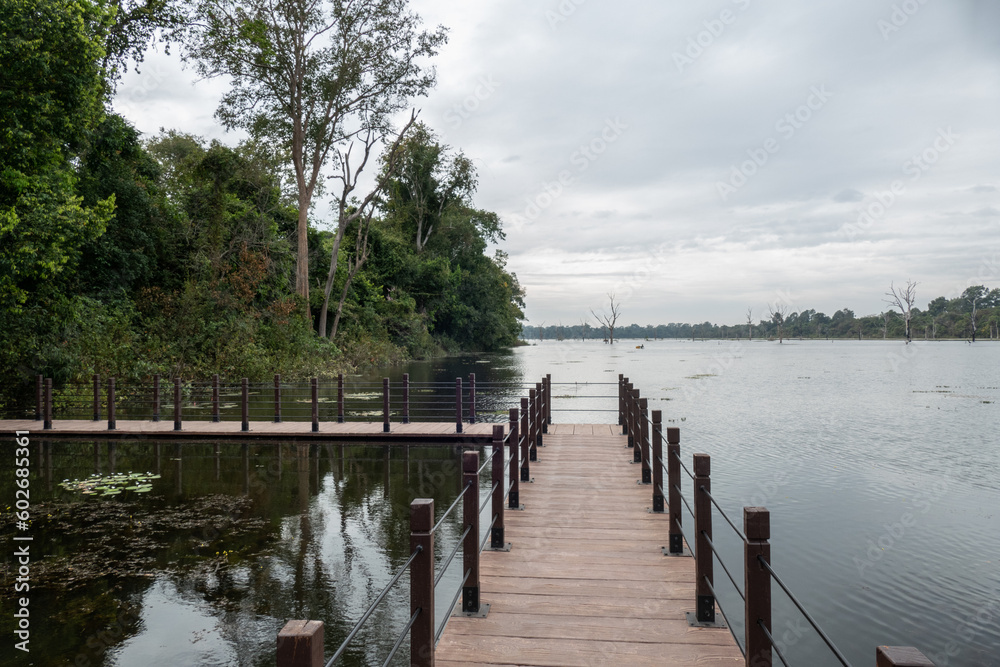 Obraz premium West Baray Lake, is a reservoir, at Angkor, Cambodia, oriented east–west and located just west of the walled city Angkor Thom