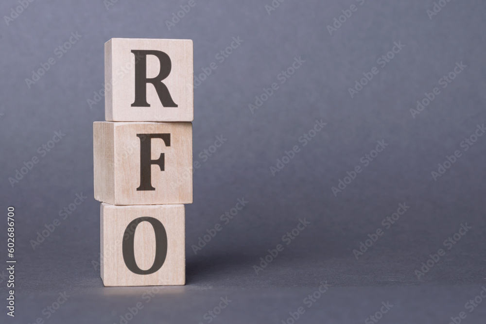 REQUEST FOR OFFER- RFO text on wooden block, gray background REQUEST FOR OFFER- RFO text on wooden block, gray background