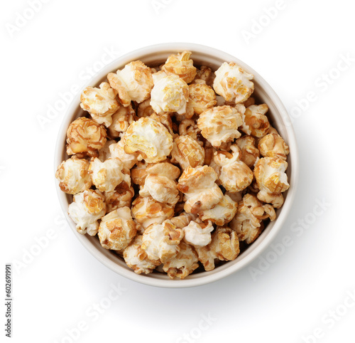 Top view of fresh caramel popcorn in ceramic bowl