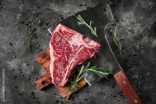 T-Bone steak marble, raw meat steak beef with rosemary photo