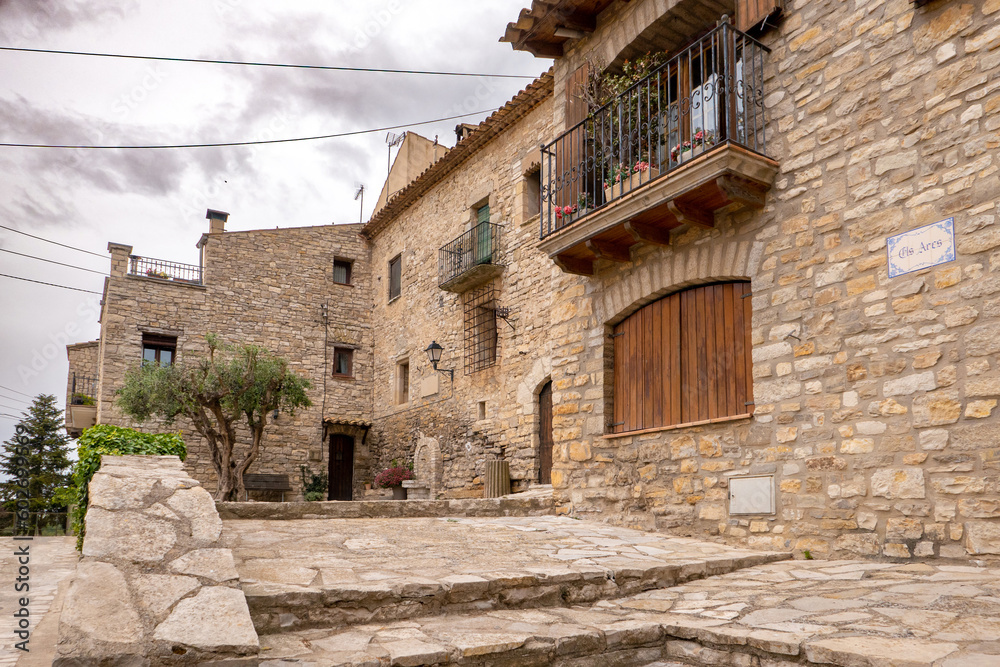 L'Astor (Anoia), Catalunya, Spain - May 14, 2023: Stone houses in the medieval village