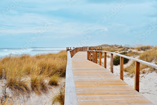 Ocean View With Wooden Path To Beach Over Sand Dunes