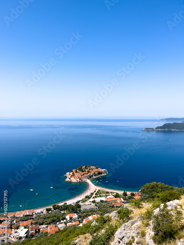 View from the mountain to the island of Sveti Stefan near the coast of a small town. Montenegro