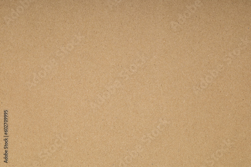Brown paper background.