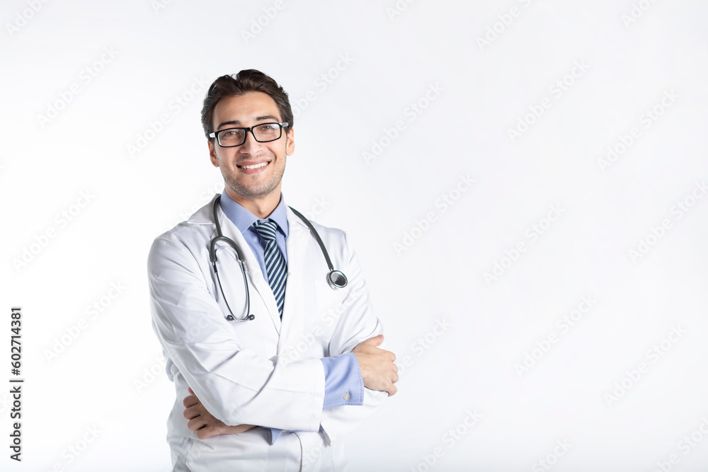 Portrait of young handsome smiling doctor in medical gown and stethoscope isolated on white background Portrait of young handsome smiling doctor in medical gown and stethoscope isolated on white background