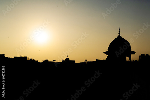Silhouette of the old Juma Mosque built by the Mughals in the city of Delhi, India