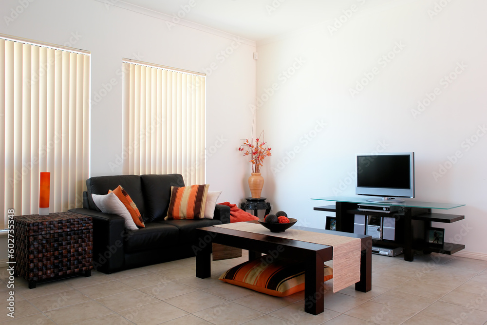 Modern Lounge Room with an orange and brown theme