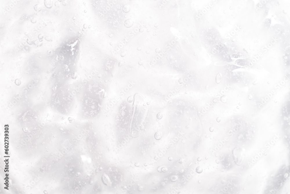 Cosmetic gel, serum transparent sample. Liquid cream with bubble texture. Gel texture of a cosmetic product. Clear liquid lotion for skin care. Cosmetic gel, serum transparent sample. Liquid cream with bubble texture. Gel texture of a cosmetic product. Clear liquid lotion for skin care.