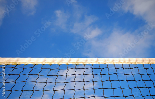 Tennis net and cloudy blue sky © Designpics